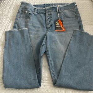 Jag faded jeans with frayed edges.